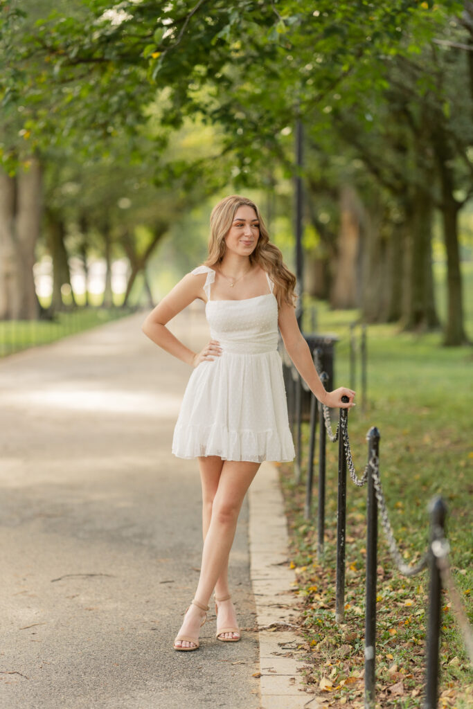 high school girl posing for her senior portraits at the national mall in washington d.c.