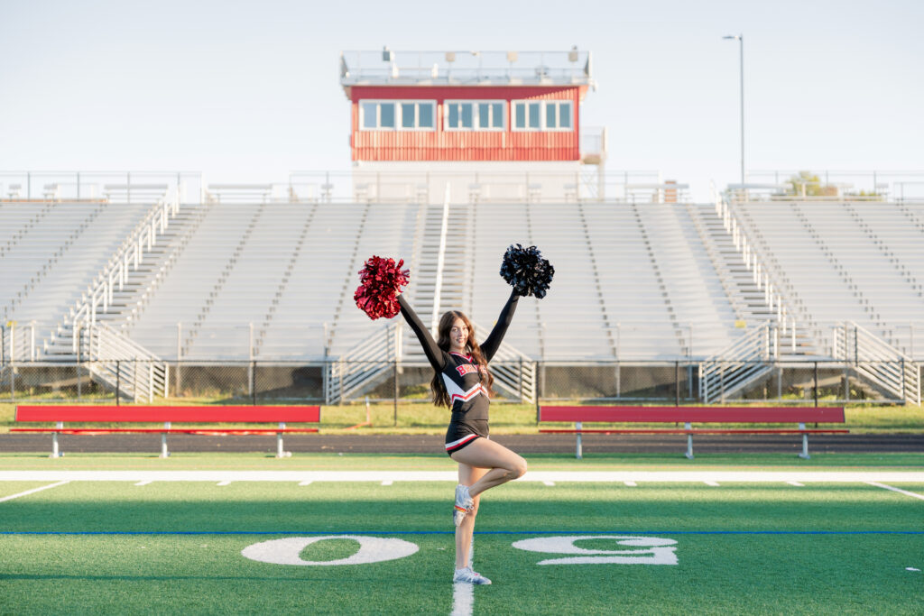 Cheerleading senior pictures at Chopticon High School! See Lilly's sunrise football field session with Southern Maryland senior photographer K Nicole Photography.